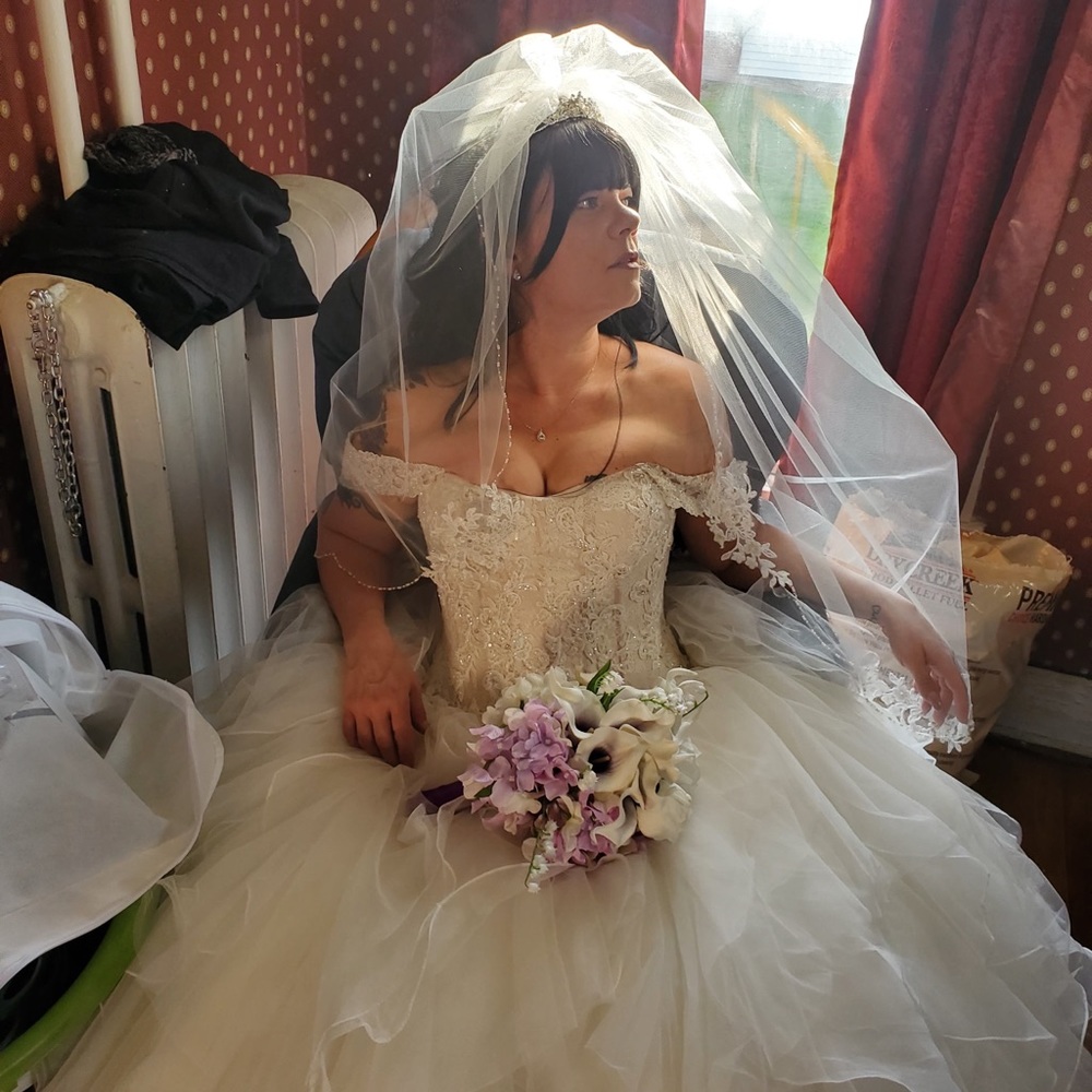 Selling a beautiful Off white wedding veil with beautiful embellishments!!!!
